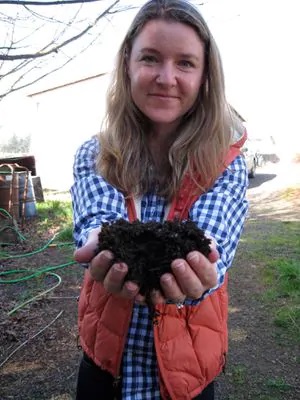 Winemaker Mimi Casteel with some of the compost she built for a healthy habitat for her microorganisms and robust topsoil at her Vineyard in Oregon's Willamette Valley